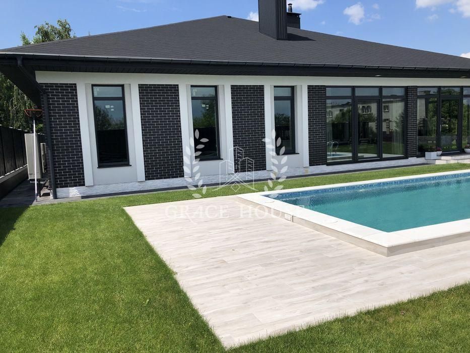 Продажа дома с бассейном Козин Конча-Заспа 0,15 га выход на воду дамба