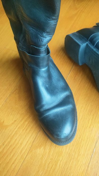 Botas cano alto. Pele