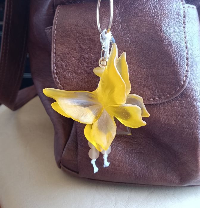 Bag charm artesanal borboleta