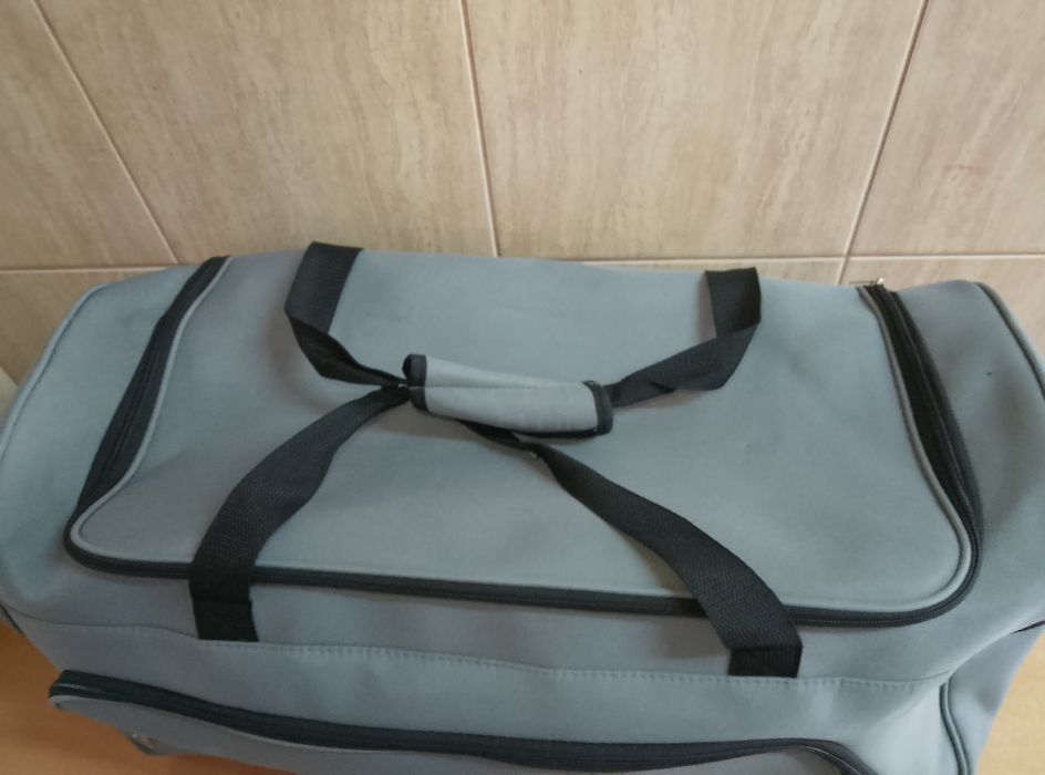 Duża torba podróżna na kółkach 70x35x35 cm 80L