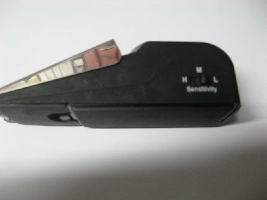 Travão de porta com alarme