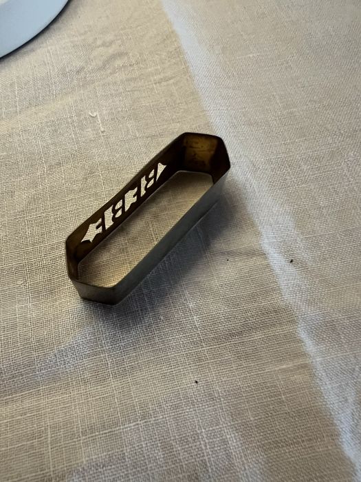 Marcador de guardanapo em prata