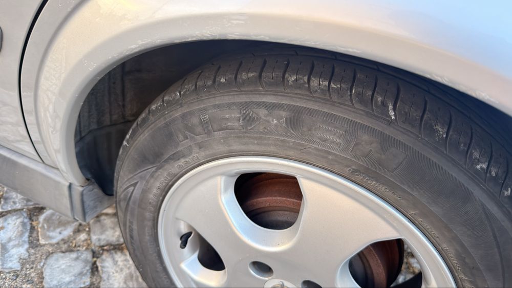 Opel 4 portas 165 mil km motor impecavel 2mil foto 4