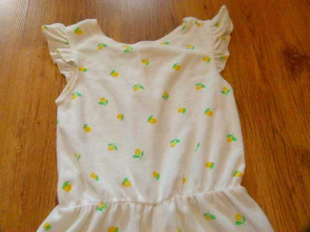 rozm 128 Primark kombinezon frotte biały w kwiaty żółte