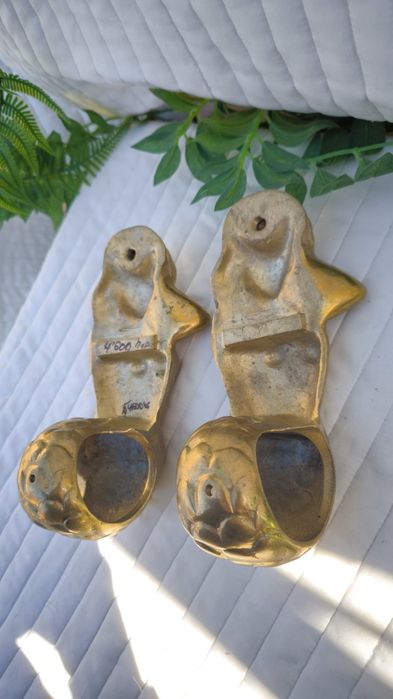 Продам бронзові чи латуні кріплення для карнизу..Масивні.Русалки