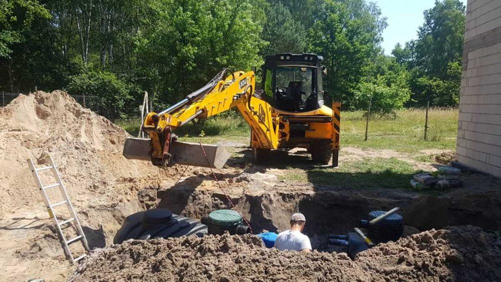 Usługi Koparko Ładowarką Kucie młotem, Koparka, wykopy , transport 20t