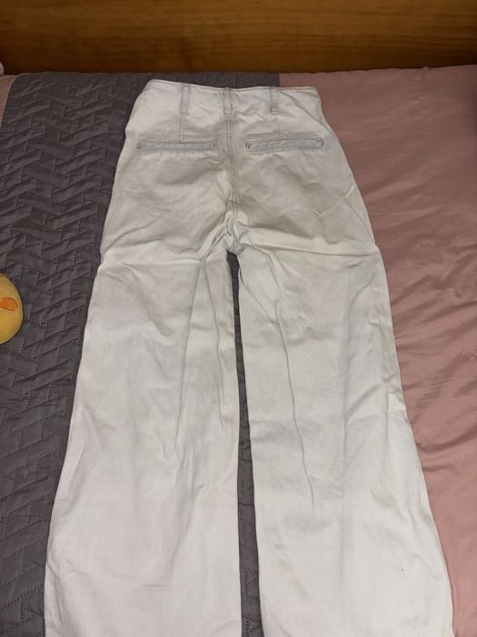 Calças de ganga super elegabtes com botões dourados