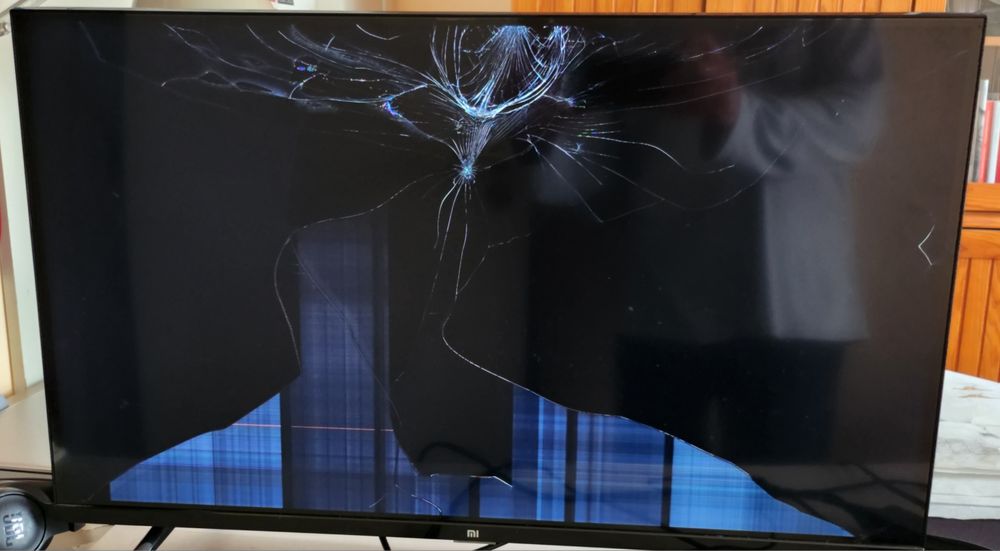 TV Xiami 32" ecrã danificado