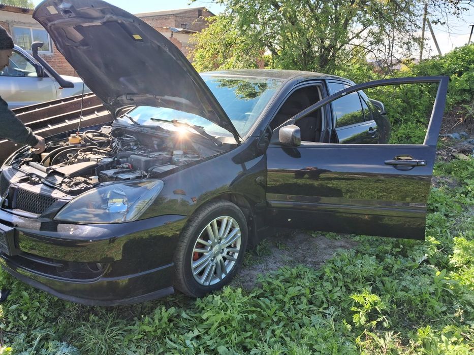 Крило,бампер Mitsubishi Lancer 9Розборка,шрот,,ланцер9