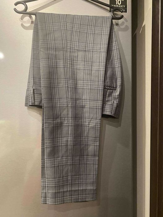 REMUS UOMO nowe eleganckie spodnie męskie 70% wełna