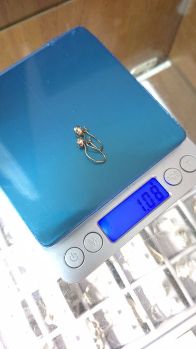 Золоті сережки кульки з алмазним гравіюванням із червоного золота 585