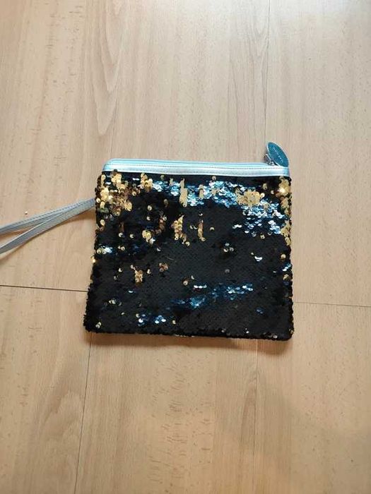 Mala de mão tipo clutch