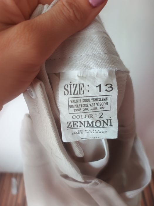 Sprzedam garnitur+ koszula 152