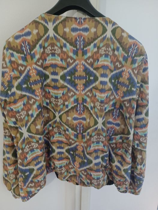 Kurtka z koralikami 48