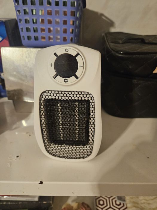 Aquecedor pequeno e outros artigos