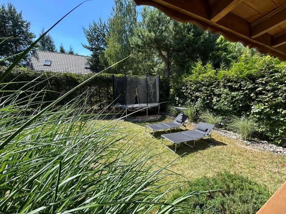 Domek nad Jeziorem Piaseczno Chata Soła, kominek taras