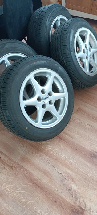 Sprzedam.Koła Alu.+opona letnia.