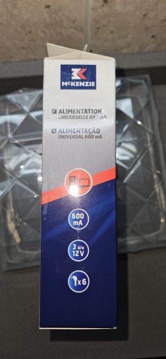 Carregador novo em caixa