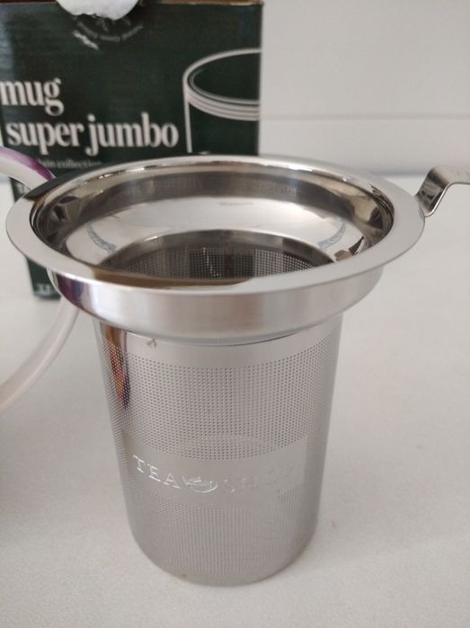 Chávena de chá e filtro da Tea Shop