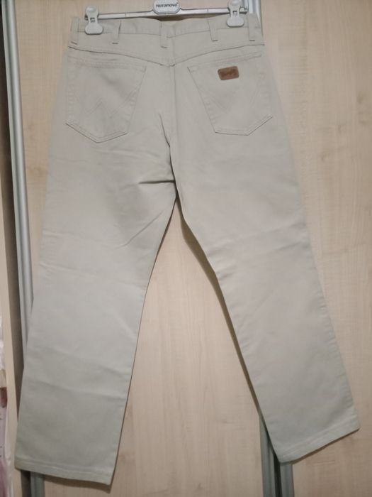 Spodnie beżowe-Wrangler