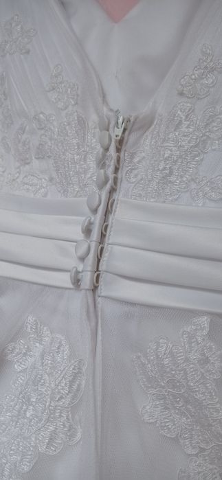 Suknia ślubna White One.