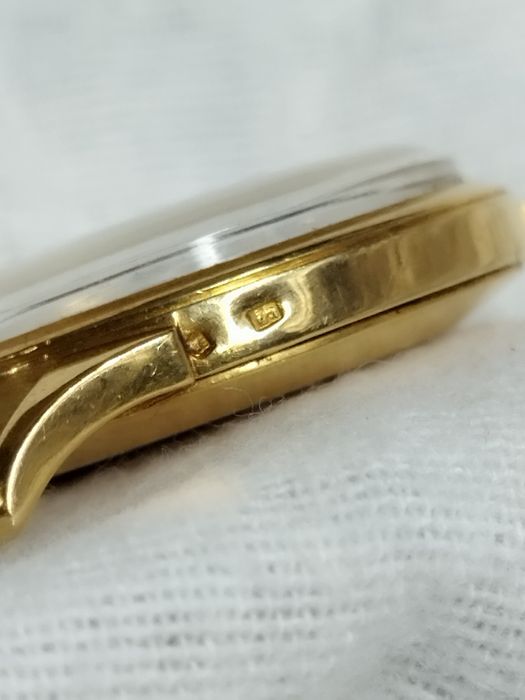 Relógio Zenith automático em ouro  
180