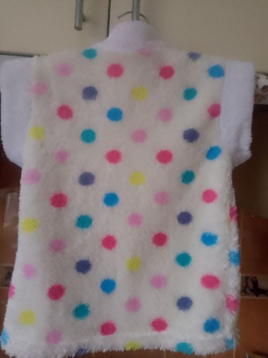 Теплі жилетки на зиму