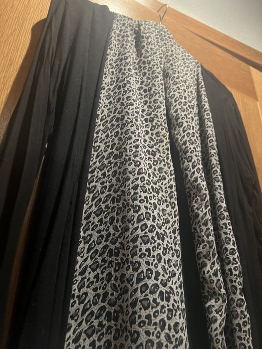 Casaco preto com leopardo