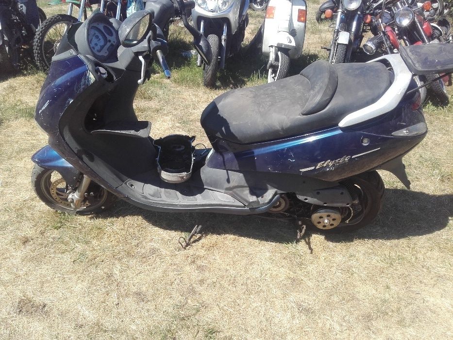 peugeot elyseo 125 rozrusznik lagi koło felga owiewka lampa bak części