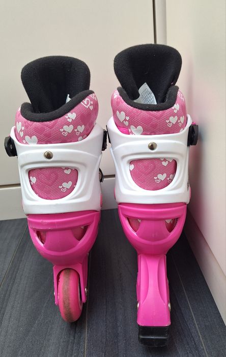 Patins em linha rosa