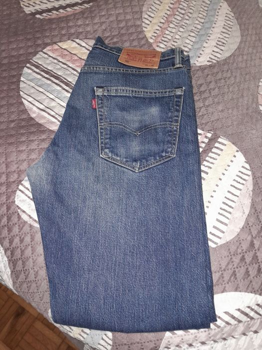 Calças levi's 502 portes grátis