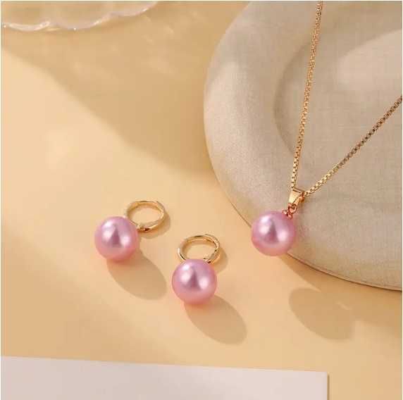 Прикраси з рожевою перлиною