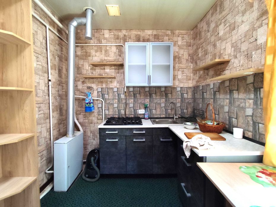 Продам в Валках часть дома в статусе квартиры