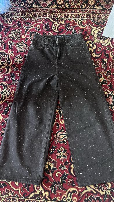 Джинси в камінці