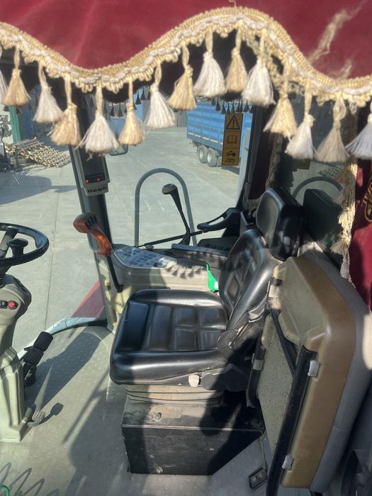 Acros 580,в коплекті з жаткою на транспортному візку