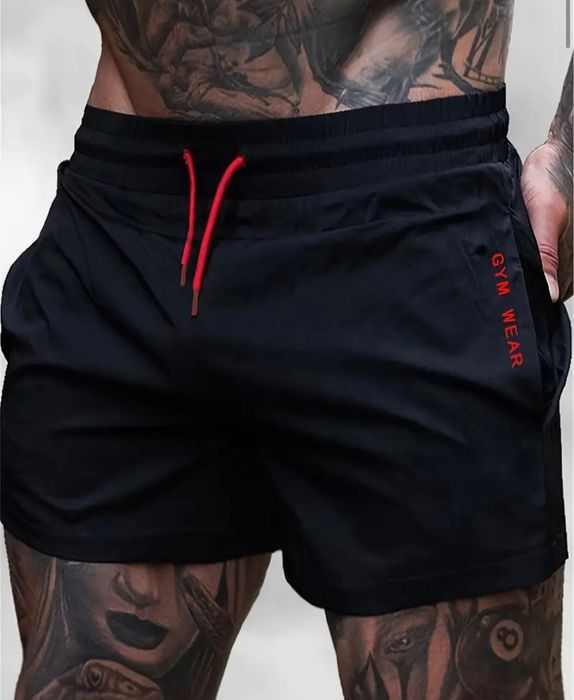 Нові спортивні чоловічі чорні шорти