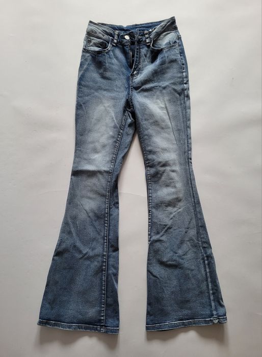 Jasne jeansowe spodnie dzwony bootcut flare wysoki stan przetarcia XS