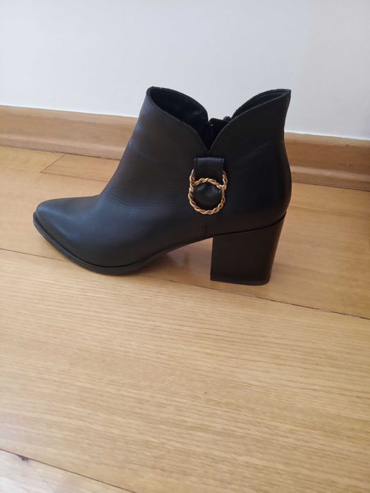 botins pretos como novos