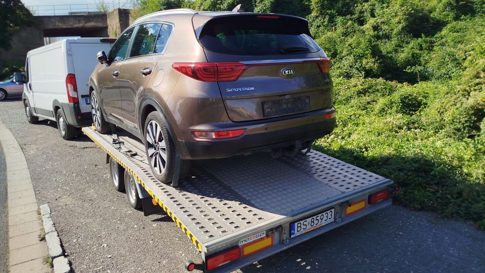 Transport pojazdów / towarów Autolaweta Pomoc drogowa