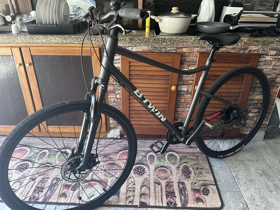 Bicicleta Híbrida B'TWIN Riverside 500 – Travões de Disco