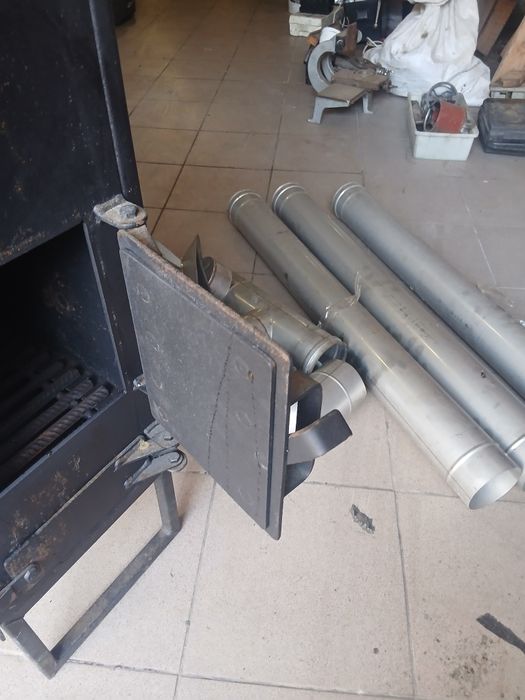 Продам печку -буржуйку ,с трубами дымохода из нержавейки