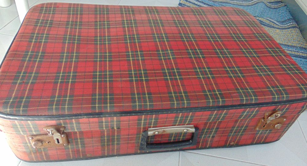 Mala de viagem vermelha