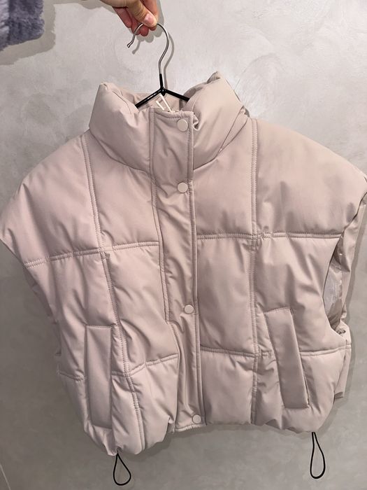 стильна жіноча жилетка