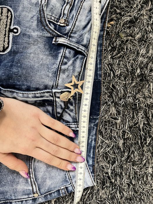 Spodnie jeansowe z dziurami