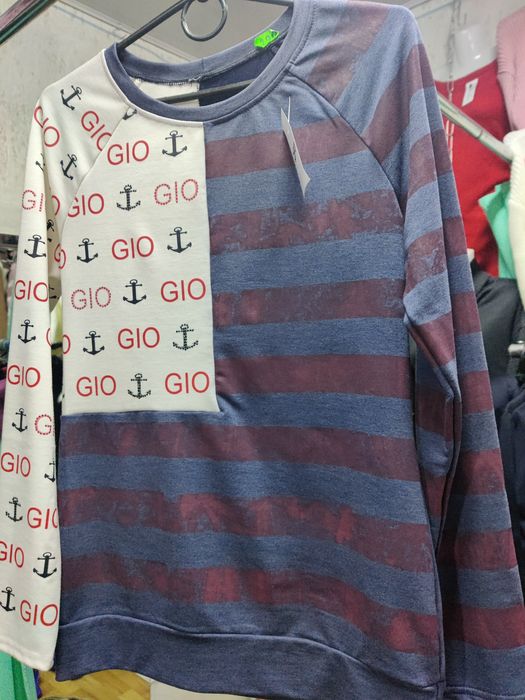 Кофти жіночі в'язані,на флісі і трикотажні