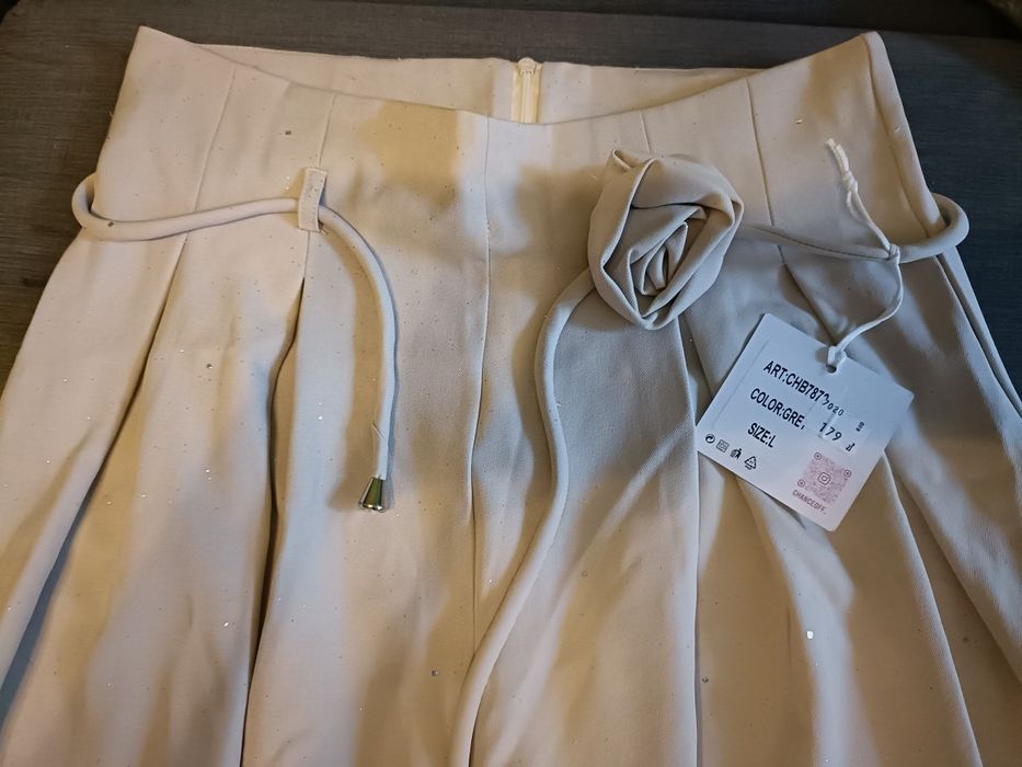 Spodnie damskie szerokie kremowe rozm L