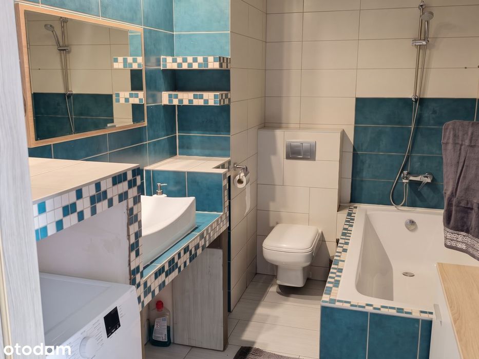 Dwa pokoje, 47 m² w centrum Siechnic – balkon i loggia plus garaż.