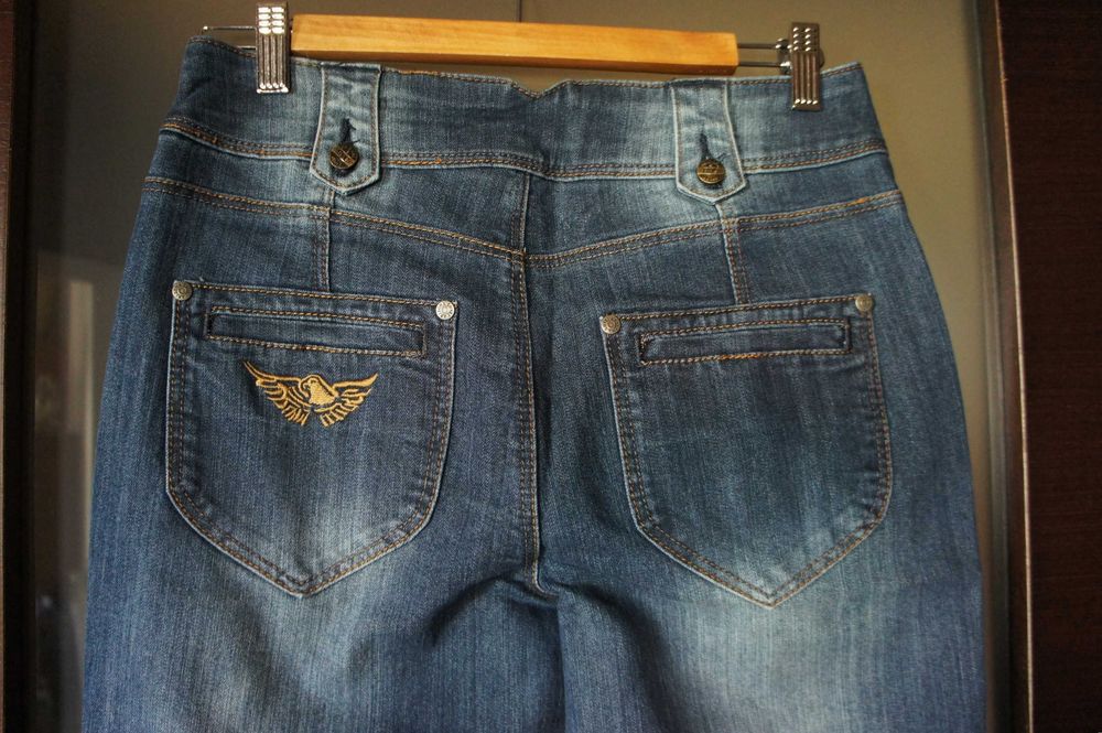 damskie spodnie dżinsy dzwony wysoki stan 40 L jeans flare za 1/2 ceny