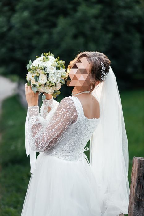 Ніжна весільна сукня