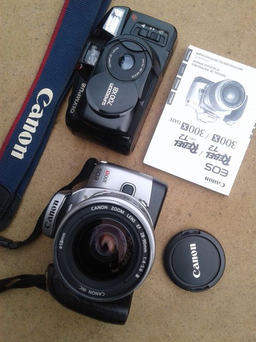 Фотоаппарат " Canon EOS 300X " , "Olympus Superzoom 700XB "